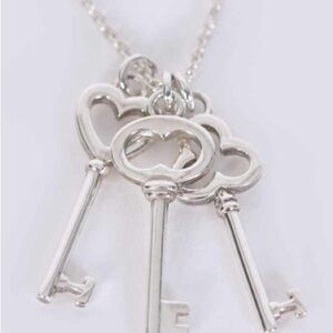 Tiffany & Co. Silver Key Trio Pendant Necklace in Excellent Condition.